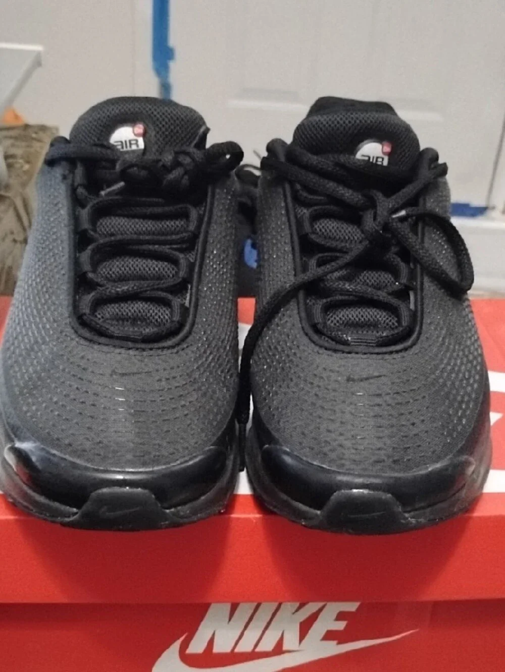 Nike Men’s Black Low-Top Sneakers with Clear Air Pods